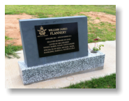 Concrete Look headstone with black granite panel and harcourt grey base