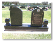 Two Tan Black Tombstone headstones and base Two vases plus Bronze Plaque